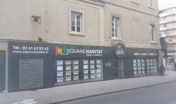 Peinture sur vitrine d'une agence immobilière Angers